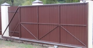 Купить откатные ворота из профнастила Белореченск, цена от 1800 руб.