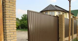 Купить откатные ворота из профнастила Белореченск, цена от 1800 руб.